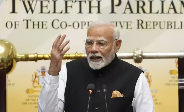 India's Prime Minister Narendra Modi addresses members of Parliament, in Georgetown, Guyana, Thursday, Nov. 21, 2024. (AP Photo/Matias Delacroix)