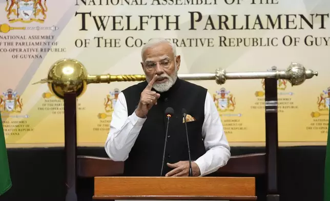 India's Prime Minister Narendra Modi addresses members of Parliament, in Georgetown, Guyana, Thursday, Nov. 21, 2024. (AP Photo/Matias Delacroix)