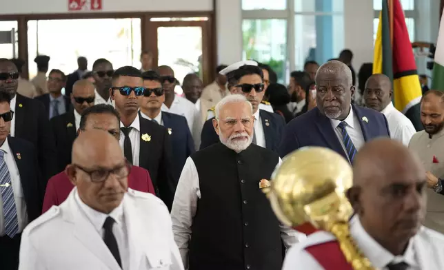 India's Prime Minister Narendra Modi arrives to Parliament in Georgetown, Guyana, Thursday, Nov. 21, 2024. (AP Photo/Matias Delacroix)