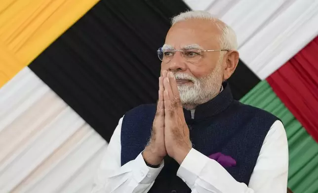 India's Prime Minister Narendra Modi arrives to Government House for a meeting with Guyana's President Mohammed Irfaan Ali, in Georgetown, Guyana, Wednesday, Nov. 20, 2024. (AP Photo/Matias Delacroix)