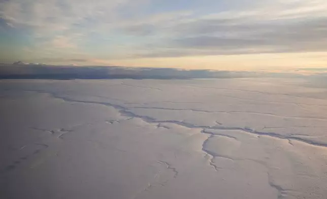 The snow-covered coastal plain area of the Arctic National Wildlife Refuge is seen, Monday, Oct. 14, 2024, near Kaktovik, Alaska. (AP Photo/Lindsey Wasson)