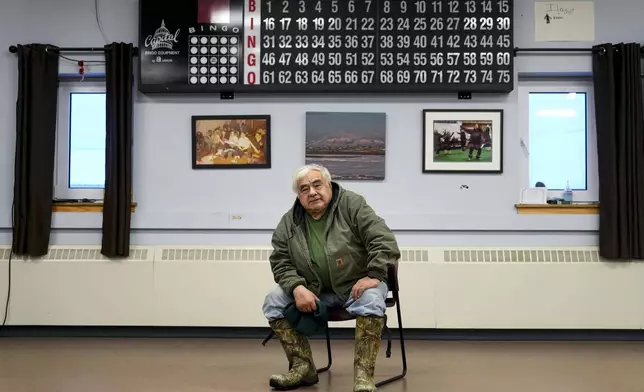 Robert Thompson, an Inupiaq hunter and polar bear guide who opposes oil drilling in the Arctic National Wildlife Refuge, poses for a portrait at the village community center and city hall, Wednesday, Oct. 16, 2024, in Kaktovik, Alaska. (AP Photo/Lindsey Wasson)