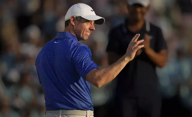 Rory McIlroy of Northern Ireland celebrates after winning the World Tour Golf Championship, in Dubai, United Arab Emirates, Sunday, Nov. 17, 2024. (AP Photo/Altaf Qadri)