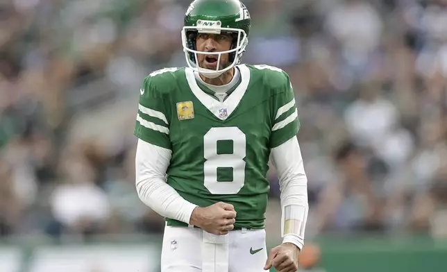 New York Jets quarterback Aaron Rodgers (8) reacts during the fourth quarter of an NFL football game against the Indianapolis Colts, Sunday, Nov. 17, 2024, in East Rutherford, N.J. (AP Photo/Adam Hunger)