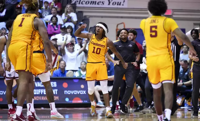 Iowa State guard Keshon Gilbert (10) reacts to scoring against Dayton during the second half of an NCAA college basketball game at the Maui Invitational Tuesday, Nov. 26, 2024, in Lahaina, Hawaii. Iowa State won 89-84. (AP Photo/Lindsey Wasson)