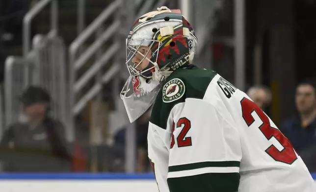 Minnesota Wild goaltender Filip Gustavsson (32) looks on during the second period of an NHL hockey game against the St. Louis Blues on Tuesday, Nov. 19, 2024, in St. Louis. (AP Photo/Jeff Le)