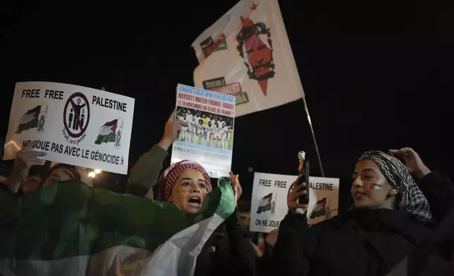 Demonstrators attend a rally in support of the Palestinian people, ahead of the Nations League soccer match France against Israel, Thursday, Nov. 14, 2024 in Saint-Denis, outside Paris. (AP Photo/Christophe Ena)