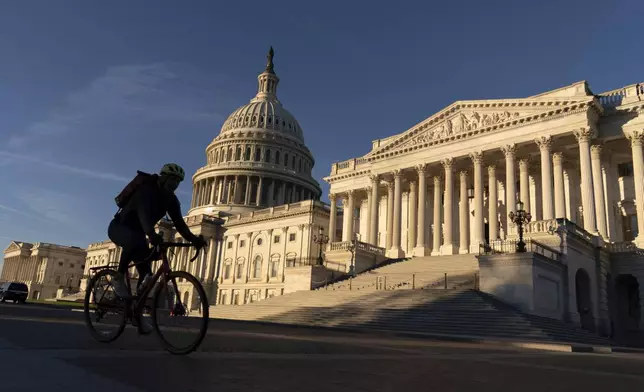 The U.S. Capitol is seen on a sunrise on Capitol Hill, in Washington, Wednesday, Nov. 13, 2024. (AP Photo/Jose Luis Magana)