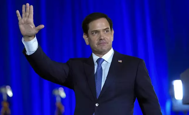 Sen. Marco Rubio, R-Fla., waves before Republican presidential candidate former President Donald Trump speaks at his birthday celebration, hosted by Club 47, in West Palm Beach, Fla., June 14, 2024. (AP Photo/Gerald Herbert, File)