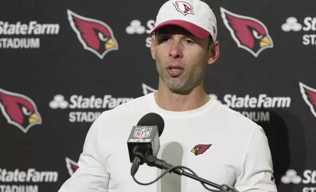 Arizona Cardinals head coach Jonathan Gannon speaks during a news conference after an NFL football game Sunday, Nov. 24, 2024, in Seattle. The Seahawks won 16-6. (AP Photo/Stephen Brashear)