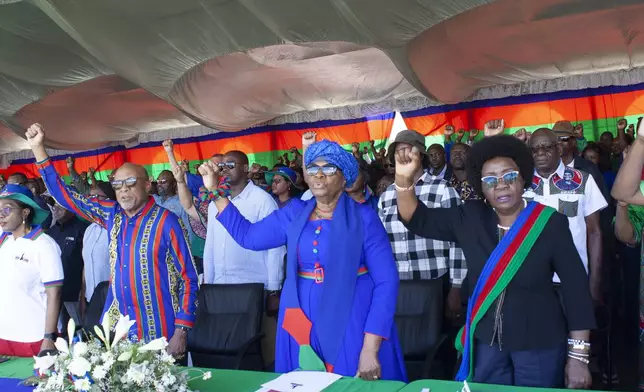 Namibia's vice president Netumbo Nandi-Ndaitwah, center, of the ruling South West Africa People's Organization, (SWAPO) attends an election rally in Windhoek, Namibia, Sunday, Nov. 24, 2024, ahead of elections Wednesday, Nov. 27, 2024. (AP Photo/Esther Mbathera)