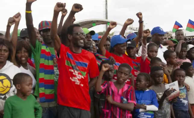 Members of the ruling South West Africa People's Organization, (SWAPO) attends an election rally in Windhoek, Namibia, Sunday, Nov. 24, 2024 ahead of elections Wednesday, Nov. 27, 2024. (AP Photo/Esther Mbathera)