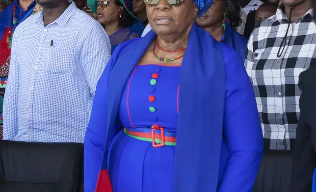 Namibia's vice president Netumbo Nandi-Ndaitwah, centre, of the ruling South West Africa People's Organization, (SWAPO) attends an election rally in Windhoek, Namibia, Sunday, Nov. 24, 2024 ahead of elections Wednesday, Nov. 27, 2024. (AP Photo/Esther Mbathera)