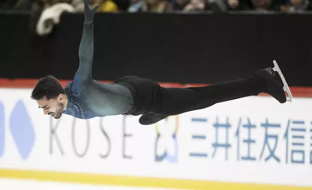 Kevin Aymoz of France performs during the men's free skating at the international figure skating competition Finlandia Trophy in Helsinki, Saturday, Nov. 16, 2024. (Vesa Moilanen/Lehtikuva via AP)