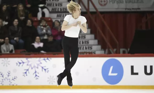 Daniel Grassl of Italy performs during the men's free skating at the international figure skating competition Finlandia Trophy in Helsinki, Saturday, Nov. 16, 2024. (Vesa Moilanen/Lehtikuva via AP)