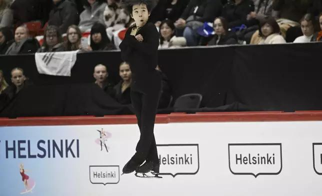 Yuma Kagiyama of Japan performs during the men's free skating at the international figure skating competition Finlandia Trophy in Helsinki, Saturday, Nov. 16, 2024. (Vesa Moilanen/Lehtikuva via AP)