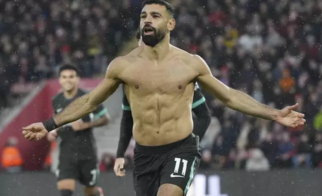 Liverpool's Mohamed Salah celebrates after scoring during the English Premier League soccer match between Southampton and Liverpool in Southampton, England, Sunday, Nov. 24, 2024. (AP Photo/Sean Ryan)