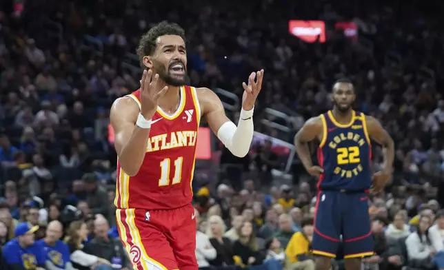 Atlanta Hawks guard Trae Young reacts during the first half of an NBA basketball game against the Golden State Warriors, Wednesday, Nov. 20, 2024, in San Francisco. (AP Photo/Godofredo A. Vásquez)