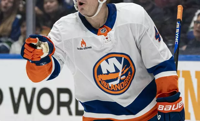 New York Islanders' Jean-Gabriel Pageau celebrates after scoring a goal against the Vancouver Canucks during the first period of an NHL hockey game, Thursday, Nov. 14, 2024 in Vancouver, British Columbia. (Rich Lam/The Canadian Press via AP)