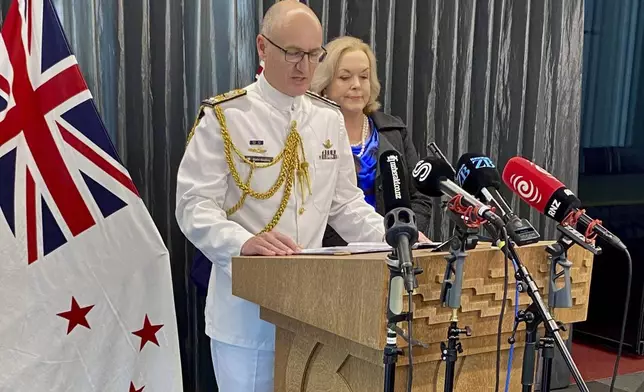 New Zealand Chief of Navy Rear Admiral Garin Golding, left, and Defense Minister Judith Collins hold a press conference in Auckland, Friday, Nov. 29, 2024, following the preliminary findings of the military Court of Inquiry into the sinking of a New Zealand navy ship on a Samoan reef in October. (Lawrence Smith/Stuff via AP)