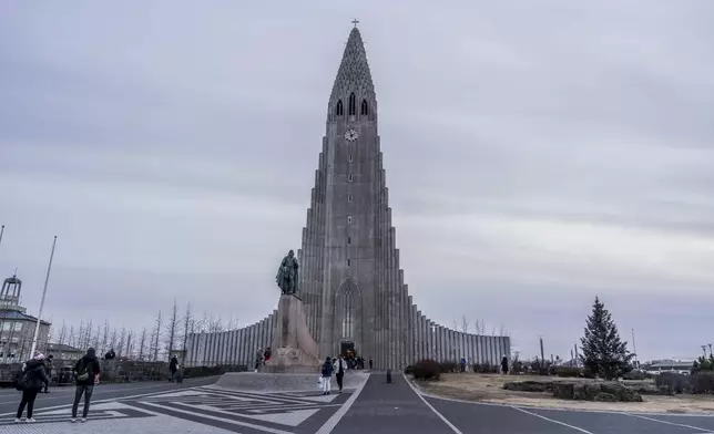 A view of Hallgrímskirkja, the main church of Reykjavík and the most famous landmark of the capital of Iceland, in Reykjavik, Iceland, Friday, Nov. 29, 2024. (AP Photo Marco Di Marco)