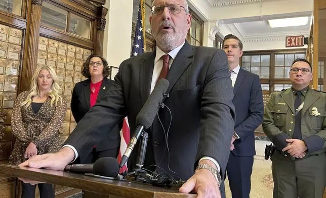 Minnesota U.S. Attorney Andy Luger addresses reporters on Friday, Nov. 22, 2024, at the federal courthouse in Fergus Falls, Minn., after two men were found guilty of human smuggling charges in connection with a case that led to the deaths of a family of four from India, who tried to cross the Canada-U.S. border during a blizzard in 2022. (Steve Lambert/The Canadian Press via AP)