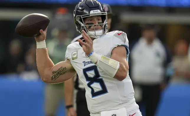 Tennessee Titans quarterback Will Levis (8) looks to throw a pass during the first half of an NFL football game against the Los Angeles Chargers, Sunday, Nov. 10, 2024, in Inglewood, Calif. (AP Photo/Gregory Bull)