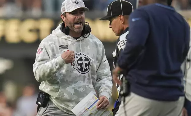 Tennessee Titans head coach Brian Callahan yells at an official during the first half of an NFL football game against the Los Angeles Chargers, Sunday, Nov. 10, 2024, in Inglewood, Calif. (AP Photo/Gregory Bull)