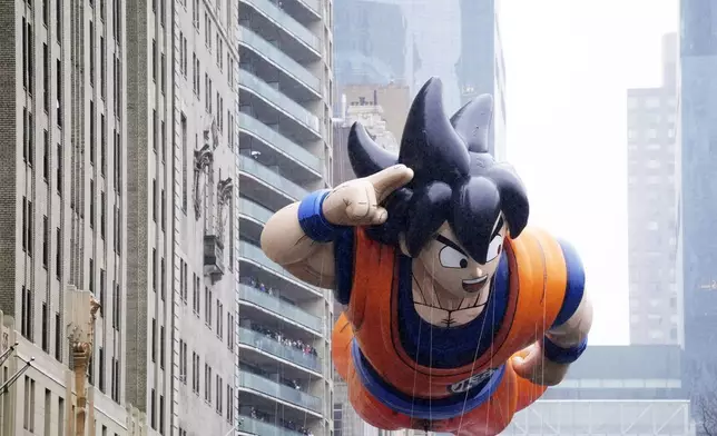 The Goku balloon floats in the Macy's Thanksgiving Day Parade on Thursday, Nov. 28, 2024, in New York. (Photo by Charles Sykes/Invision/AP)