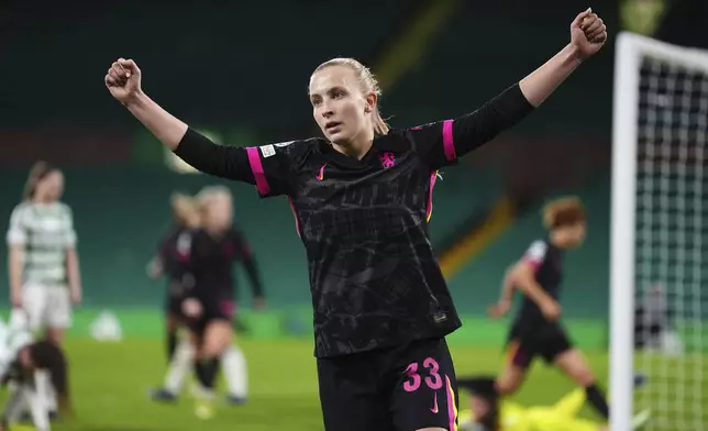 Chelsea's Aggie Beever-Jones celebrates providing the assist for Maika Hamano to score their first goal of the game, during the Women's Champions League, group B soccer match between Celtic Women and Chelsea Women, at Celtic Park, Glasgow, Scotland, Wednesday Nov. 13, 2024. (Andrew Milligan/PA via AP)