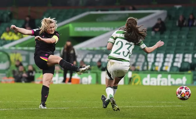 Chelsea's Erin Cuthbert shoots at goal, during the Women's Champions League, group B soccer match between Celtic Women and Chelsea Women, at Celtic Park, Glasgow, Scotland, Wednesday Nov. 13, 2024. (Andrew Milligan/PA via AP)