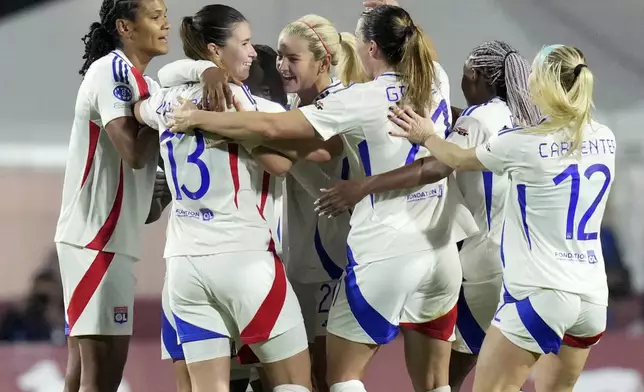 Olympique Lyonnais' scorer Melchie Dumornay, third left, and her teammates celebrate their side's second goal during the women's Champions League soccer match between AS Roma and Olympique Lyon in Rome, Italy, Wednesday, Nov. 13, 2024 (Photo by Alfredo Falcone/LaPresse via AP)