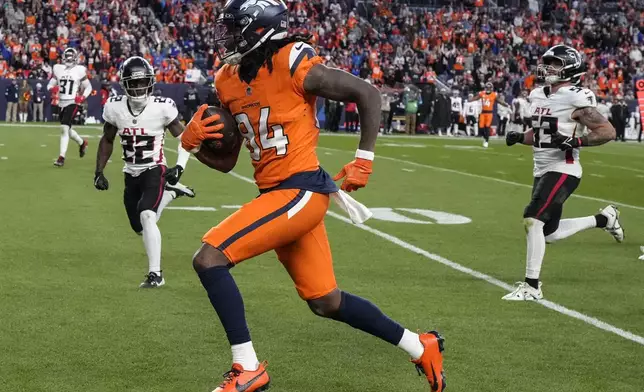 Denver Broncos wide receiver Lil'Jordan Humphrey (84) runs into the end zone for a touchdown against the Atlanta Falcons during the second half of an NFL football game, Sunday, Nov. 17, 2024, in Denver. (AP Photo/Jack Dempsey)