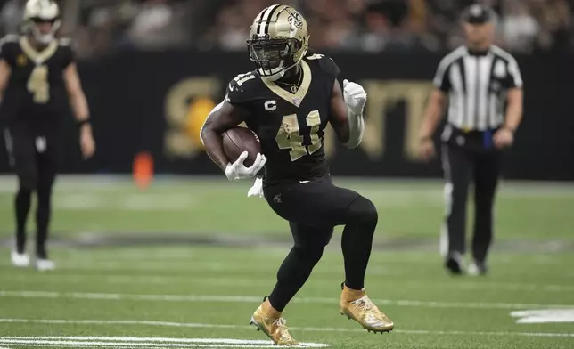 New Orleans Saints running back Alvin Kamara (41) carries in the second half of an NFL football game against the Cleveland Browns in New Orleans, Sunday, Nov. 17, 2024. (AP Photo/Gerald Herbert)