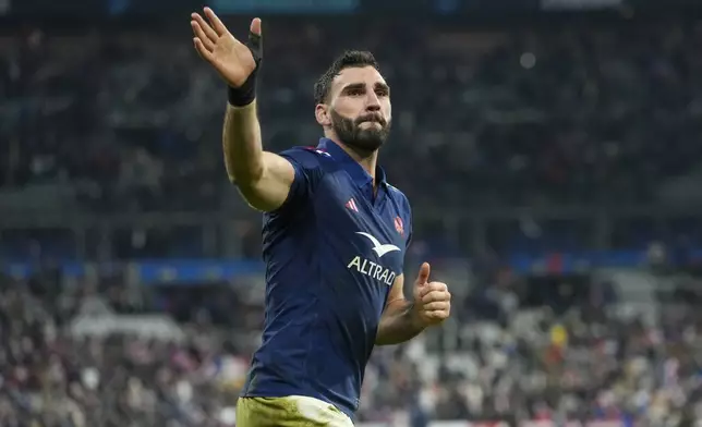 France's Charles Olivon waves to supporters following the Autumn Nations Series rugby international between France and Argentina at the Stade de France stadium at Saint-Denis on the outskirts of Paris, Friday, Nov. 22, 2024. (AP Photo/Thibault Camus)