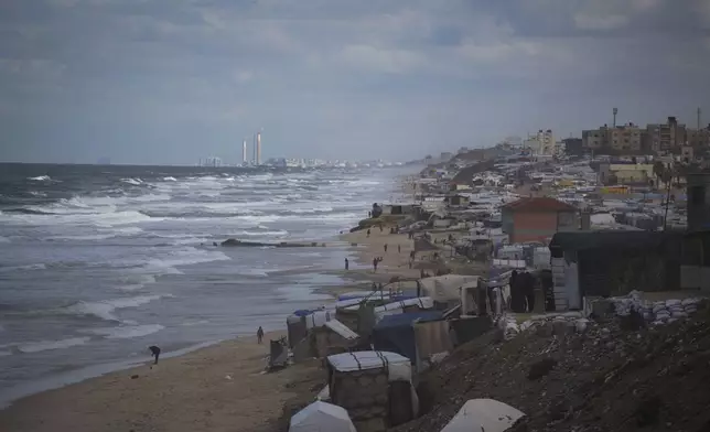 Tents occupied by displaced Palestinians are seen at the beach in Deir al-Balah, Gaza Strip, Tuesday Nov. 26, 2024. (AP Photo/Abdel Kareem Hana)