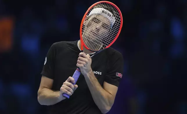 Taylor Fritz of the United States reacts during the final match of the ATP World Tour Finals against Italy's Jannik Sinner at the Inalpi Arena, in Turin, Italy, Sunday, Nov. 17, 2024. (AP Photo/Antonio Calanni)