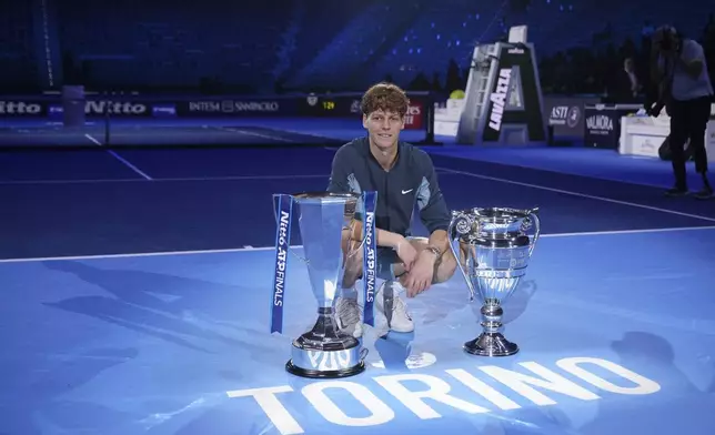 Italy's Jannik Sinner poses after winning the final match of the ATP World Tour Finals against Taylor Fritz of the United States at the Inalpi Arena, in Turin, Italy, Sunday, Nov. 17, 2024. (AP Photo/Antonio Calanni)