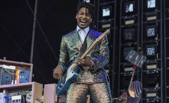 FILE - Jon Batiste performs during the Bonnaroo Music &amp; Arts Festival, June 15, 2024, in Manchester, Tenn. (Photo by Amy Harris/Invision/AP, File)