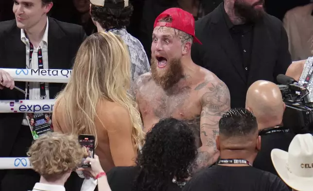 Jake Paul reacts after defeating Mike Tyson during their heavyweight boxing match, Friday, Nov. 15, 2024, in Arlington, Texas. (AP Photo/Julio Cortez)