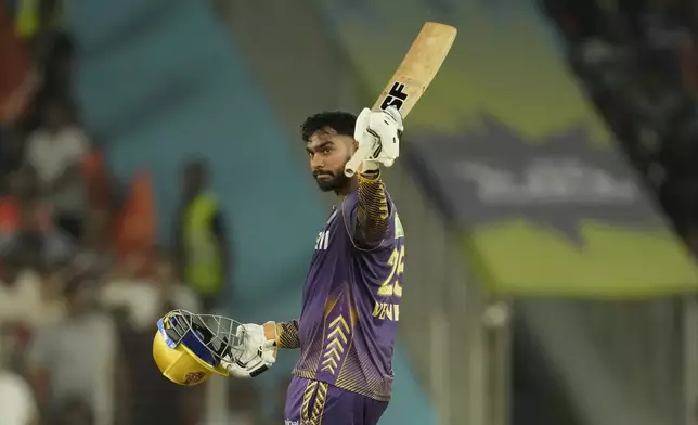 FILE - Kolkata Knight Riders' Venkatesh Iyer celebrates scoring fifty runs during the Indian Premier League qualifier cricket match between Kolkata Knight Riders and Sunrisers Hyderabad in Ahmedabad, India, on May 21, 2024. (AP Photo/Ajit Solanki, File)