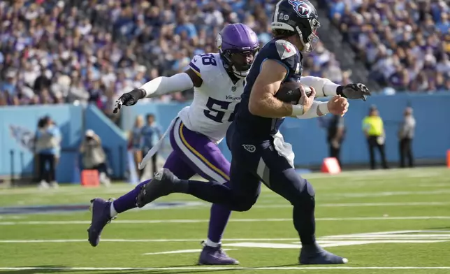 Minnesota Vikings linebacker Jonathan Greenard (58) tackled Tennessee Titans quarterback Will Levis during the first half of an NFL football game, Sunday, Nov. 17, 2024, in Nashville, Tenn. (AP Photo/George Walker IV)