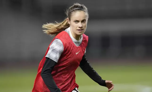 FILE - New Zealand's Katie Rood warms up prior to an international friendly soccer match against South Korea at Goyang stadium in Goyang, South Korea, Nov. 30, 2021. (AP Photo/Lee Jin-man, File)