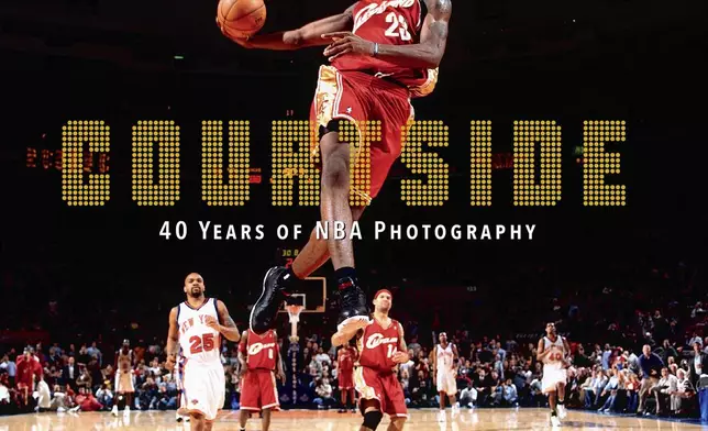 This photo shows the cover of “Courtside: 40 Years of NBA Photography” by Nathaniel S. Butler. (Abrams Books via AP)