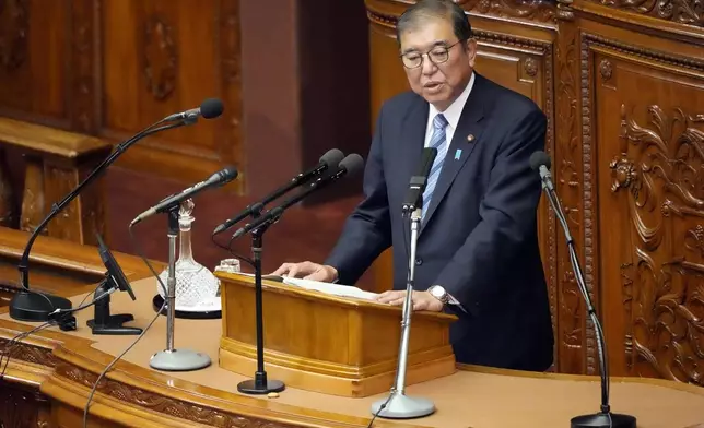 Japanese Prime Minister Shigeru Ishiba delivers his policy speech at the extraordinary session of parliament's lower house Friday, Nov. 29, 2024, in Tokyo. (AP Photo/Eugene Hoshiko)