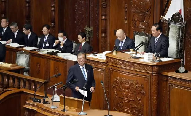 Japanese Prime Minister Shigeru Ishiba prepares to deliver his policy speech at the extraordinary session of parliament's lower house Friday, Nov. 29, 2024, in Tokyo. (AP Photo/Eugene Hoshiko)