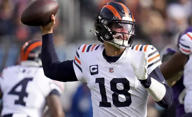 Chicago Bears quarterback Caleb Williams (18) throws a pass during the first half of an NFL football game against the Minnesota Vikings, Sunday, Nov. 24, 2024, in Chicago. (AP Photo/Erin Hooley)