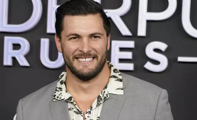 FILE - Brock Davies arrives at the season 11 premiere of "Vanderpump Rules," Wednesday, Jan. 17, 2024, at The Hollywood Palladium in Los Angeles. (Photo by Jordan Strauss/Invision/AP, File)