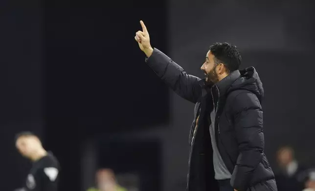 Manchester United's head coach Ruben Amorim gives instructions during the English Premier League soccer match between Ipswich Town and Manchester United at Portman Road stadium in Ipswich, England, Sunday, Nov. 24, 2024. (AP Photo/Dave Shopland)