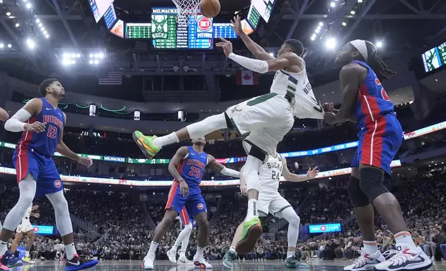 Detroit Pistons' Isaiah Stewart pulls down Milwaukee Bucks' Giannis Antetokounmpo during the second half of an NBA basketball game Wednesday, Nov. 13, 2024, in Milwaukee. Stewart was ejected from the game. (AP Photo/Morry Gash)